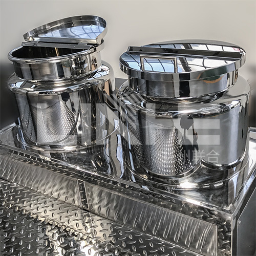 A Pan Of Boiling Water And Grease